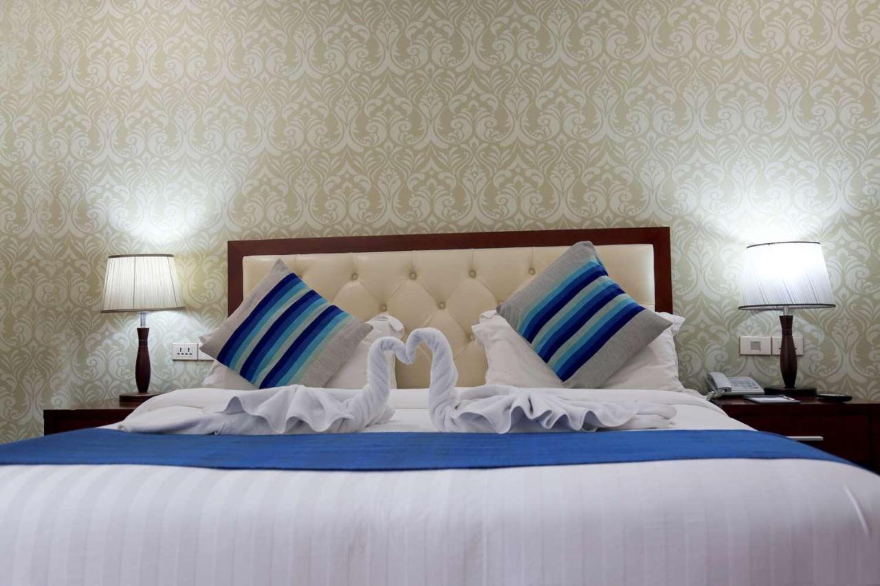 Tolip Olympia Hotel Аддис-Абеба Экстерьер фото